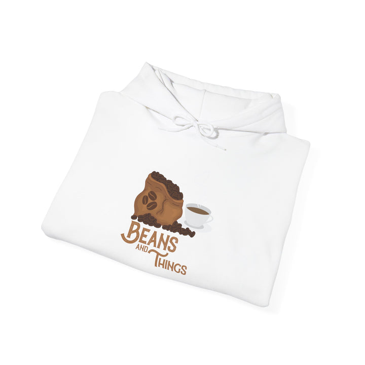A white unisex heavy blend hoodie with a graphic on the front showing a bean and the text &