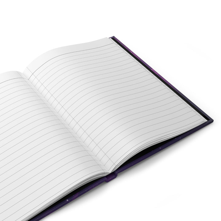 Hardcover journal with a space-themed cover, open to show blank lined pages, with the title &
