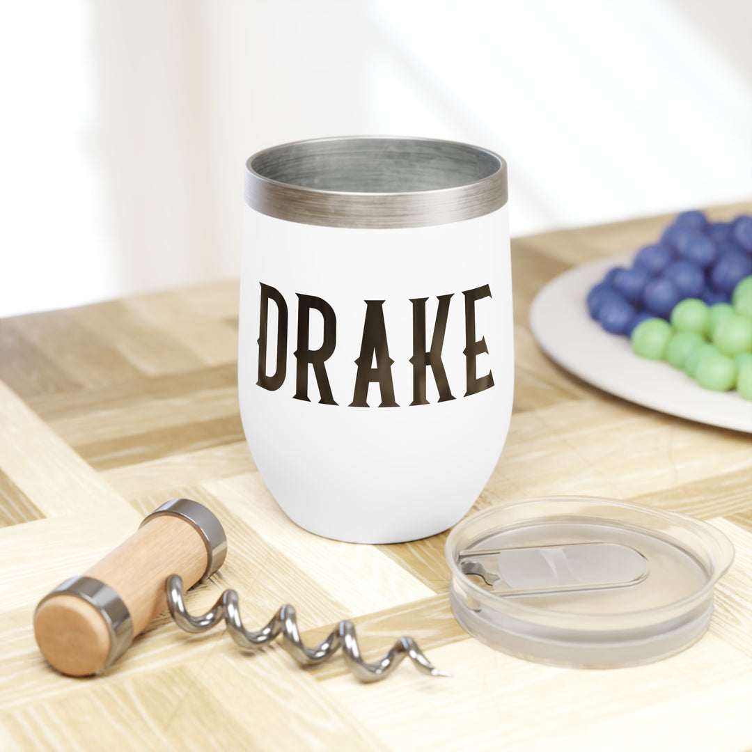 White tumbler with &