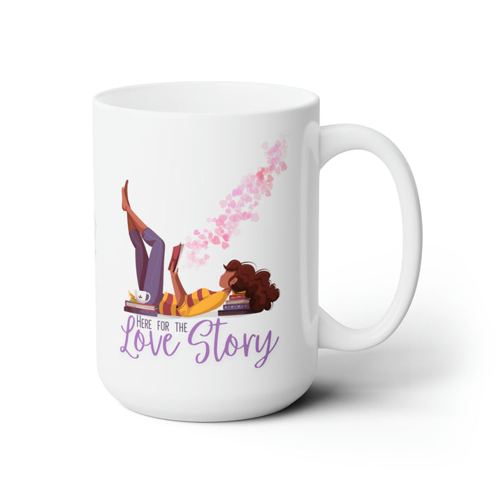 A white ceramic mug with a printed design featuring a character surrounded by pink and purple heart accents, and the text &