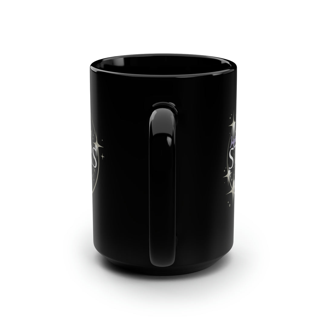 A black ceramic mug with a glossy finish, featuring a design with stars and the text &