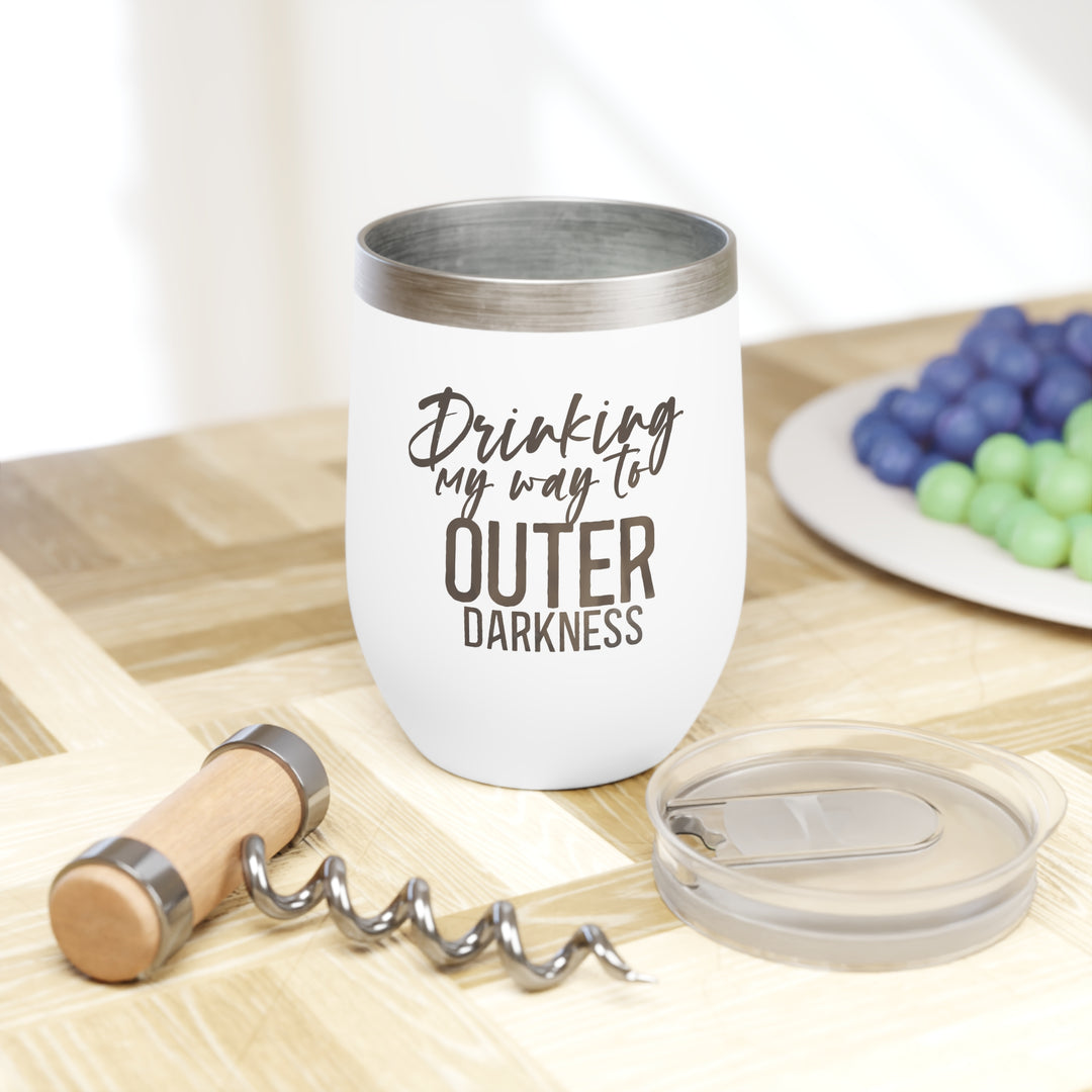 A stainless steel wine tumbler with a clear, BPA-free press-on lid featuring the text &
