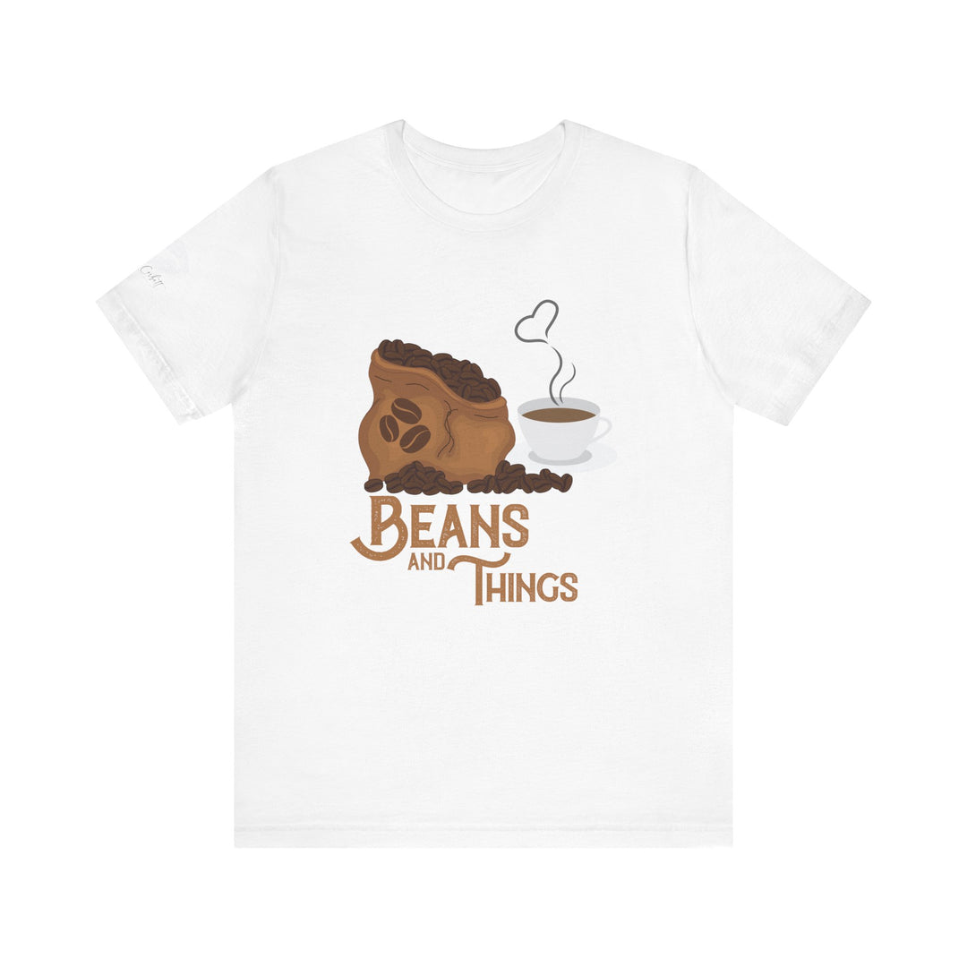 A white unisex short-sleeve t-shirt with an illustration of a cup of coffee and the text 'BEANS AND THINGS' on the front.