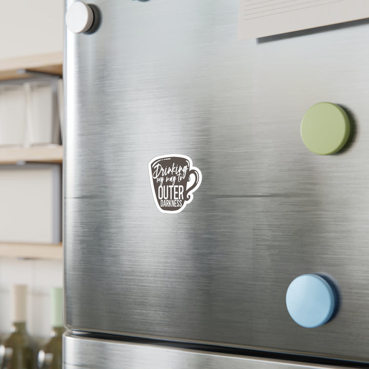 A sticker with a design that includes the text &