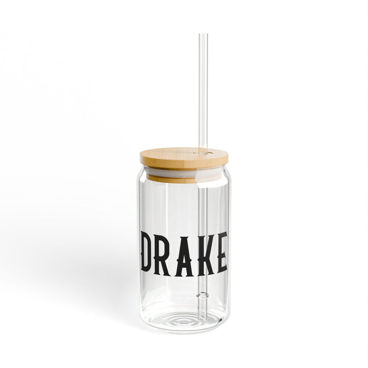 Clear tumbler with wooden lid and straw, featuring the name &