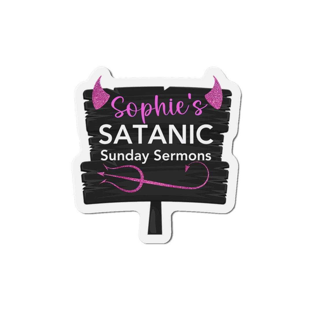 A custom die-cut magnet with vinyl material, featuring text 'Sophie's SATANIC Sunday Sermons' in white and pink on a black background, designed to look like a handmade sign.