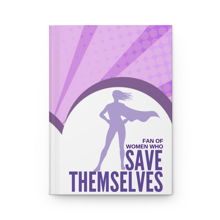 A journal with a purple and white cover featuring a silhouette of a woman superhero and the text &