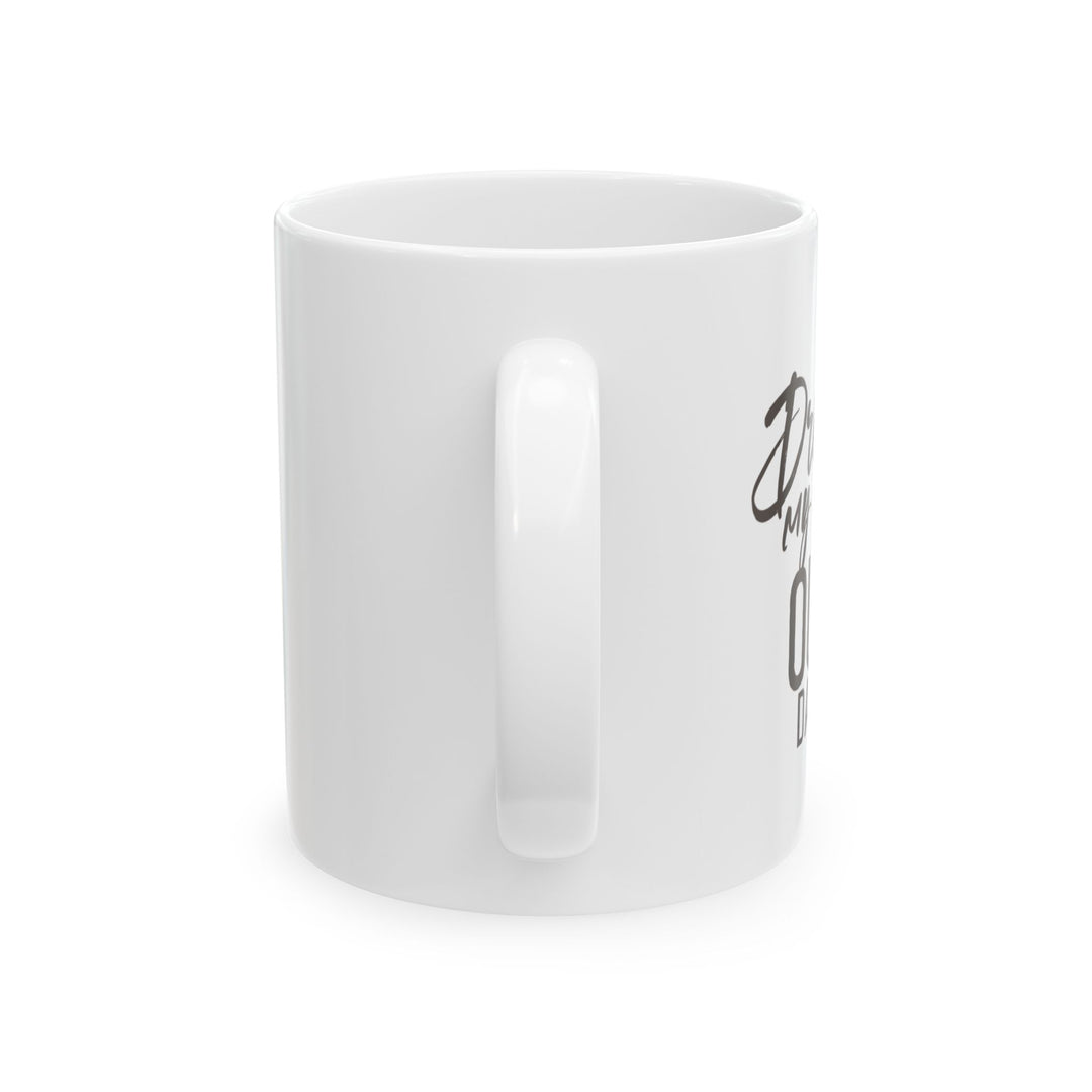 A white ceramic mug with the phrase &