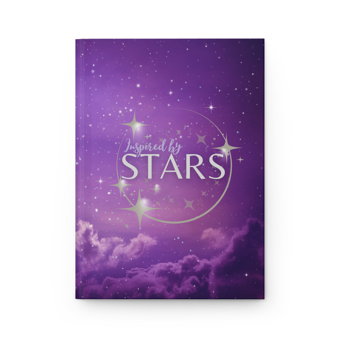 Hardcover journal with a space-themed cover, open to show blank lined pages, with the title &