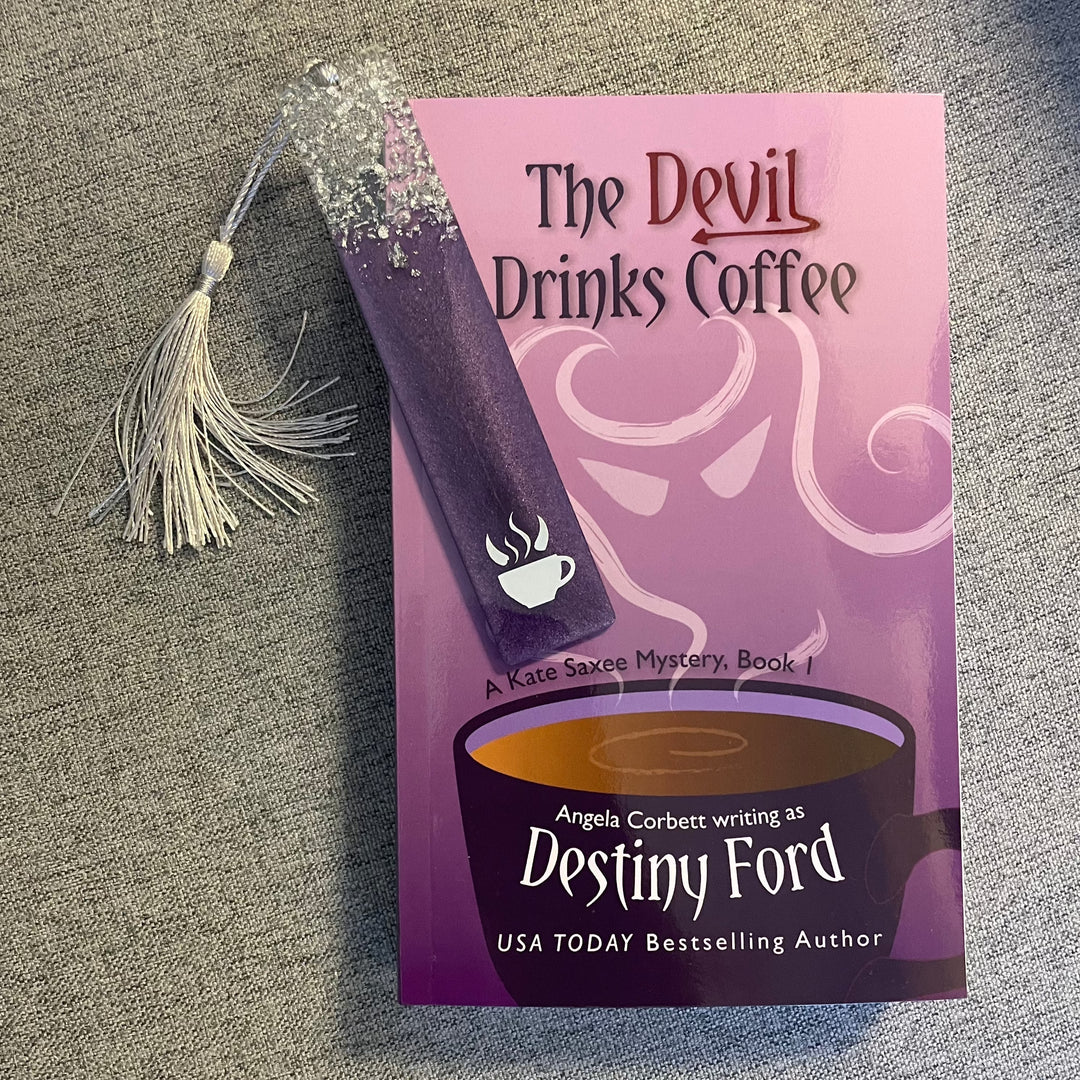 A purple bookmark on the book &
